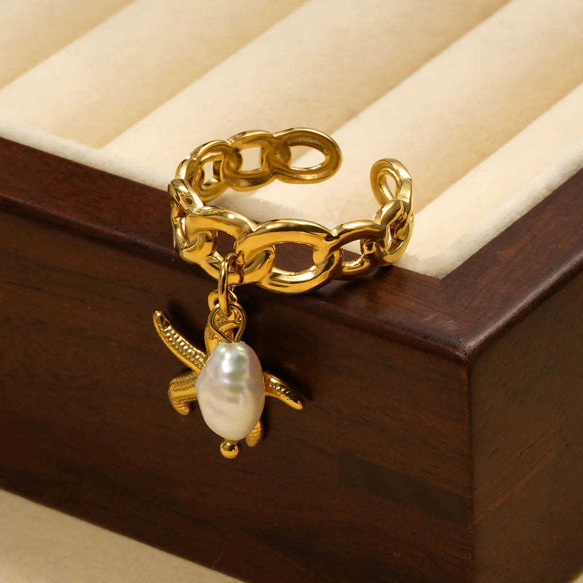 Bague maillons pendentifs étoile de mer et perle
