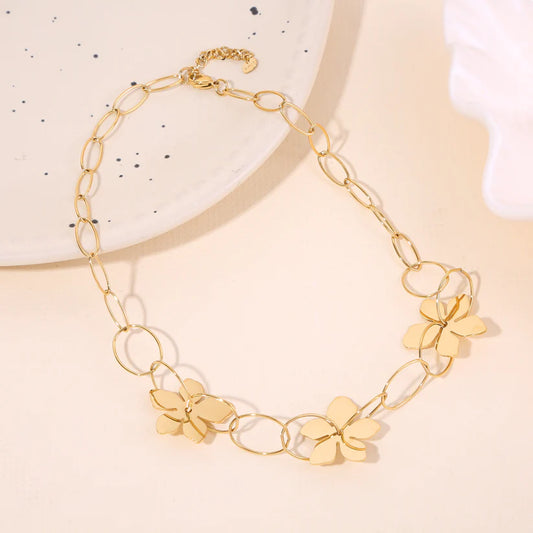 Collier Chaîne Maillons Ovales Dorée Avec Fleurs Ajourées Brillantes