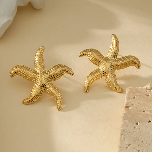 Boucles d'oreilles Dorées Etoiles de Mer Brillantes